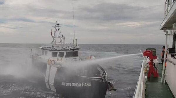 中國海警對菲侵權船隻管制現場畫面 - 俄羅斯衛星通訊社