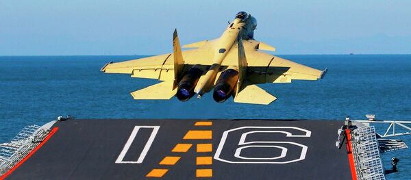 中国第二艘航母比辽宁舰大 将搭载歼-15 - 俄罗斯卫星通讯社