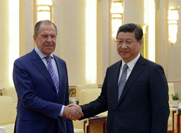 拉夫羅夫與中國國家主席習近平。 - 俄羅斯衛星通訊社