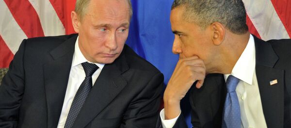 A file photo of Russian President Vladimir Putin and US President Barack Obama - 俄罗斯卫星通讯社