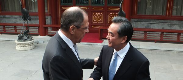 俄羅斯外長拉夫羅夫和中國外長王毅 俄羅斯外長拉夫羅夫和中國外長王毅 - 俄羅斯衛星通訊社