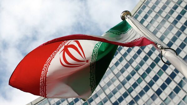 An Iranian flag flutters in front of the United Nations headquarters, during an International Atomic Energy Agency (IAEA) board of governors meeting, in Vienna, March 4, 2015. - 俄罗斯卫星通讯社