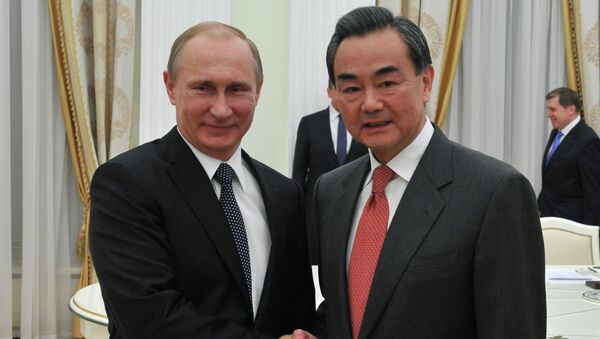 Встреча президента России В.Путина с главой МИД Китая Ваном И - 俄羅斯衛星通訊社