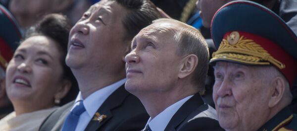 俄中领导人在莫斯科的阅兵式上交谈 - 俄罗斯卫星通讯社