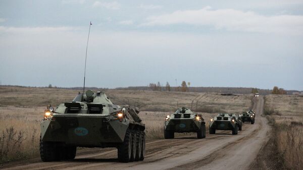 集安組織部隊演習 特遣隊乘裝甲車赴機場登機 - 俄羅斯衛星通訊社