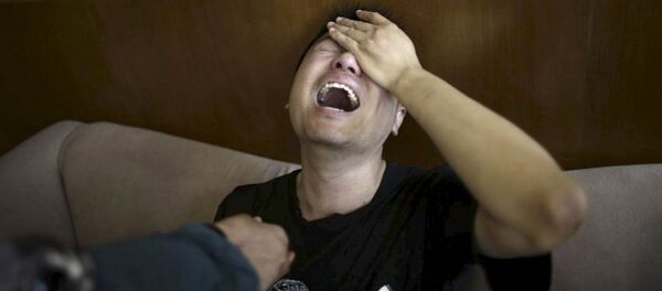 中國沈船事故中的一名乘客親屬 - 俄羅斯衛星通訊社