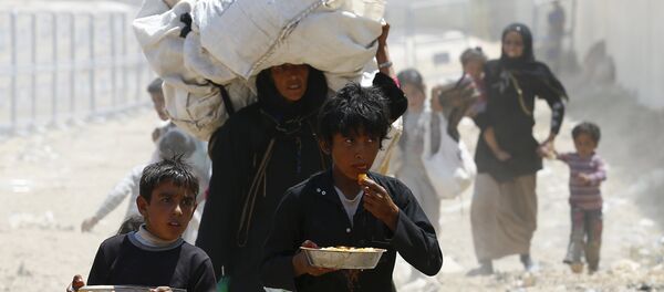 联合国:2014年全球难民人数达新高 联合国:2014年全球难民人数达新高 - 俄罗斯卫星通讯社