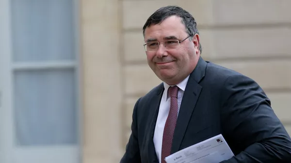 Chief executive of the French oil giant Total, Patrick Pouyanne arrives for a meeting with French President Francois Hollande to discuss the EU sanctions, at the Elysee Palace, in Paris, France, Wednesday, Jan. 7, 2015. - 俄羅斯衛星通訊社