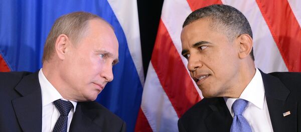 US President Barack Obama (R) listens to Russian President Vladimir Putin - 俄羅斯衛星通訊社
