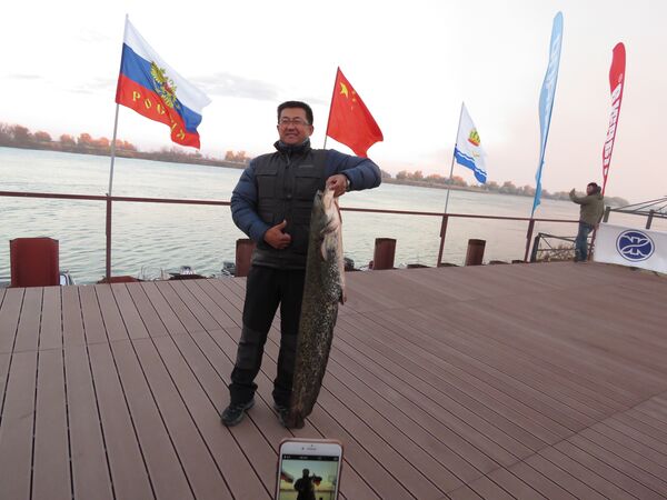 中國釣魚高手們在俄羅斯釣魚國際大賽上大顯身手 - 俄羅斯衛星通訊社