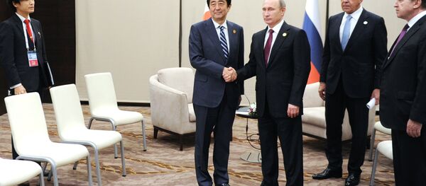 俄罗斯总统普京与日本首相安倍晋三 - 俄罗斯卫星通讯社