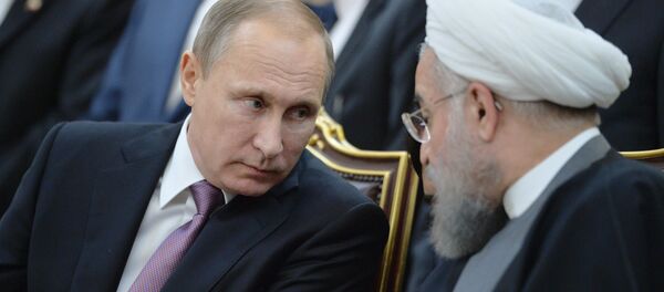 普京与伊朗总统鲁哈尼/资料图片/ - 俄罗斯卫星通讯社