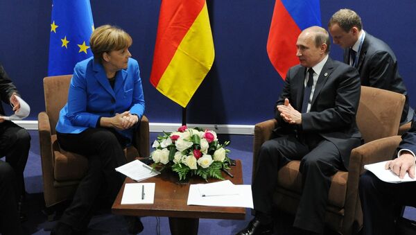普京与德国总理以及欧盟委员会主席在巴黎气候大会期间进行会谈 - 俄罗斯卫星通讯社