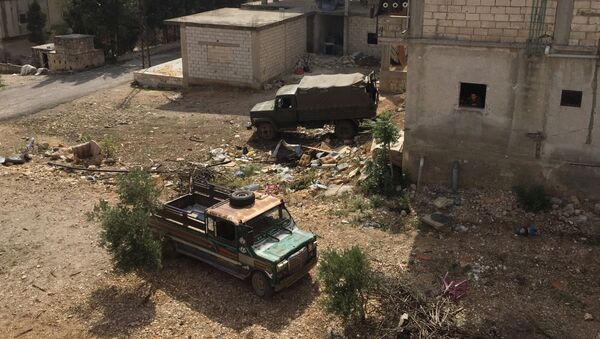 В деревне Саф-Сафа, освобожденной сирийской армией от боевиков Фронта ан-Нусра - 俄罗斯卫星通讯社
