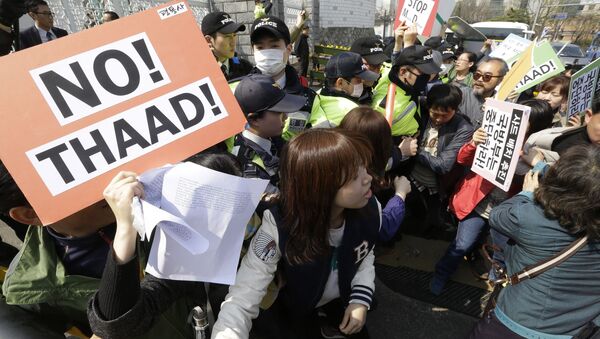 Протестующие напротив Министерства обороны в Сеуле на митинге против установки системы ПРО THAAD в Южной Корее - 俄羅斯衛星通訊社