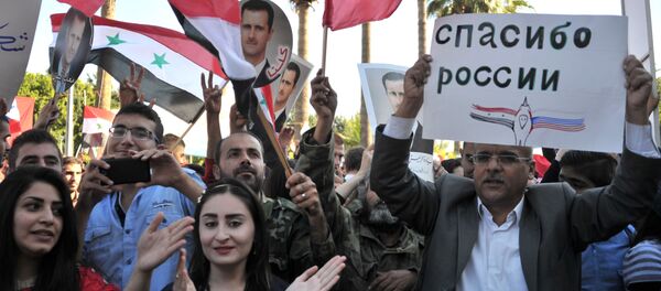 Митинг в поддержку операции российской авиагруппы в городе Тартус - 俄罗斯卫星通讯社