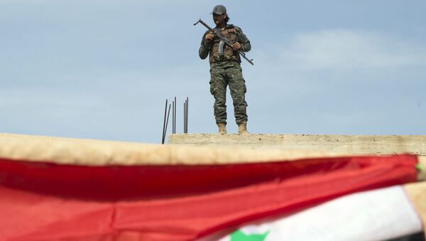 Сирийский военный возле города Хама, Сирия - 俄罗斯卫星通讯社