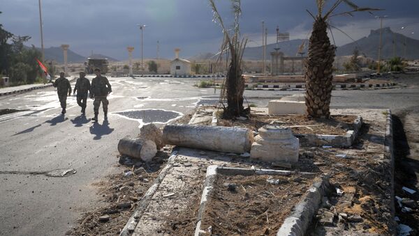 敘利亞軍人在巴爾米拉大規模墓挖出40余具屍體 - 俄羅斯衛星通訊社
