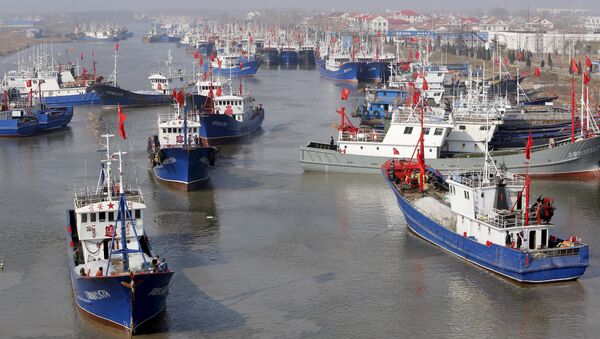 廷海警擊沈的中國漁船上的四名船員回國 - 俄羅斯衛星通訊社
