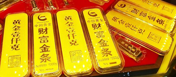 Золотые слитки в одном из магазинов Китая Золотые слитки в одном из магазинов Китая - 俄罗斯卫星通讯社