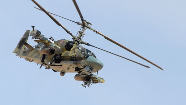 Вертолет Ка-52 Аллигатор во время боевой операции в окрестностях освобожденного от боевиков города Эль-Карьятейн - 俄羅斯衛星通訊社