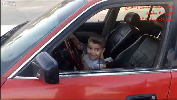 伊拉克男孩开车 - 俄罗斯卫星通讯社