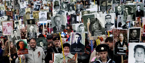 俄远东举行胜利日阅兵和“不朽军团”游行 俄远东举行胜利日阅兵和“不朽军团”游行 - 俄罗斯卫星通讯社