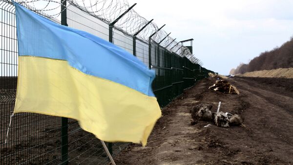 Украинский флаг на российско-украинской границе в Харьковской области - 俄羅斯衛星通訊社