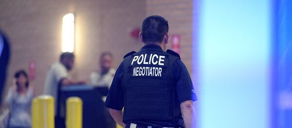 媒體：美國兩人向哀悼儀式開火 致2死8傷 - 俄羅斯衛星通訊社