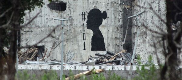 Граффити, символизирующее погибших детей за время конфликта на Донбассе, на стене разрушенного аэропорта Донецка Граффити, символизирующее погибших детей за время конфликта на Донбассе, на стене разрушенного аэропорта Донецка - 俄羅斯衛星通訊社