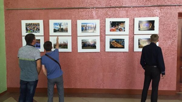 “哈巴罗夫斯克记者镜头里的中国”摄影图片展于阿穆尔斯克开幕 - 俄罗斯卫星通讯社