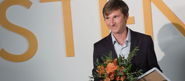 “今日俄羅斯”國際通訊社攝影記者阿列克謝·馬利加夫科，獲大賽“體育·單張照片”項目第一名。 - 俄羅斯衛星通訊社