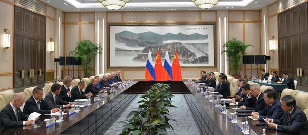 普京：俄中兩國應努力優化雙邊貿易 兩國目前走在正確的道路上 - 俄羅斯衛星通訊社