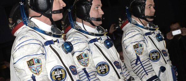 美国国家航空航天局宇航员杰弗里∙威廉姆斯、俄航天集团宇航员阿列克谢·奥夫奇宁和奥列格∙斯克里波齐卡 - 俄罗斯卫星通讯社