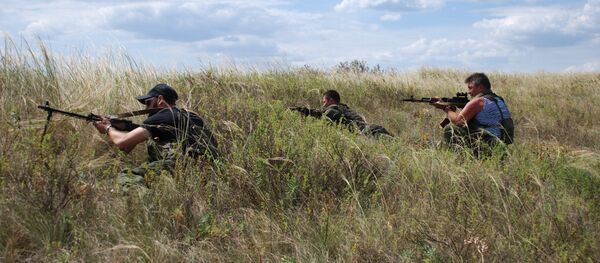 联络小组达成协议10月7日开始在顿涅茨克撤军 联络小组达成协议10月7日开始在顿涅茨克撤军 - 俄罗斯卫星通讯社