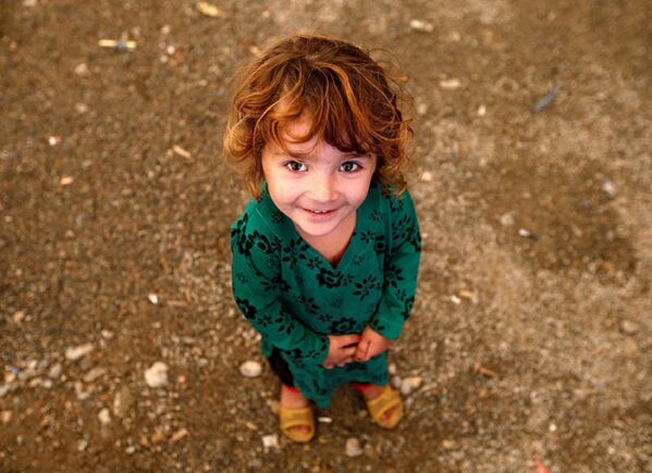 Афганская девочка, вернувшаяся в Кабул из лагеря беженцев в Пакистане - 俄罗斯卫星通讯社