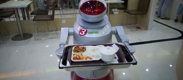 东京广播中心全职员工中一名叫Tavabo 的机器人正在工作,它为游客当导游。这种机器人能讲四种语言︰韩语、 汉语、 英语及日语。 东京广播中心全职员工中一名叫Tavabo 的机器人正在工作,它为游客当导游。这种机器人能讲四种语言︰韩语、 汉语、 英语及日语。 - 俄罗斯卫星通讯社