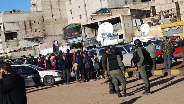 俄国防部：首批武装分子及其家属车队从阿勒颇东部抵达终点 - 俄罗斯卫星通讯社
