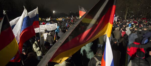 德國活動人士：俄國旗始終伴隨Pegida運動遊行 - 俄羅斯衛星通訊社