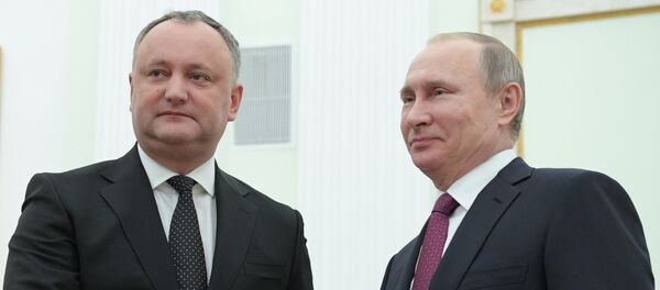 弗拉基米尔•普京与伊戈尔•多东 - 俄罗斯卫星通讯社