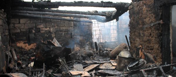 Последствия обстрела села Зайцево в Донецкой области - 俄罗斯卫星通讯社