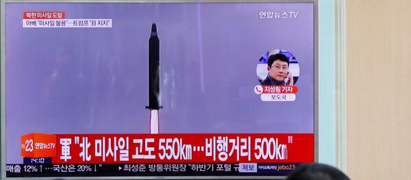 Новость о запуске ракеты в КНДР на экране телевизора в Сеуле Новость о запуске ракеты в КНДР на экране телевизора в Сеуле - 俄罗斯卫星通讯社