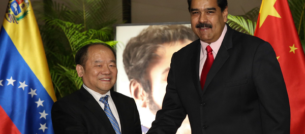 委内瑞拉同中国2月13日签订了总额27亿美元的22项新合作协议 委内瑞拉同中国2月13日签订了总额27亿美元的22项新合作协议 - 俄罗斯卫星通讯社