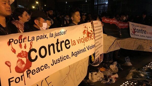 Акция протеста против убийства французскими полицейскими китайца в Париже - 俄羅斯衛星通訊社