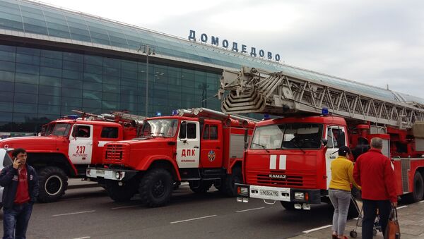 Пожарные машины у здания аэропорта Домодедово - 俄罗斯卫星通讯社