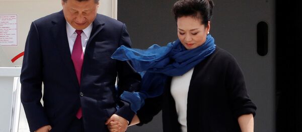 习近平与彭丽媛 - 俄罗斯卫星通讯社