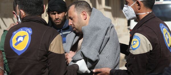 Пострадавший после газовой атаки в провинции Идлиб в Сирии - 俄羅斯衛星通訊社