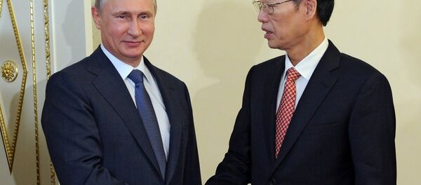 俄罗斯总统普京与中国国务院副总理张高丽。 - 俄罗斯卫星通讯社