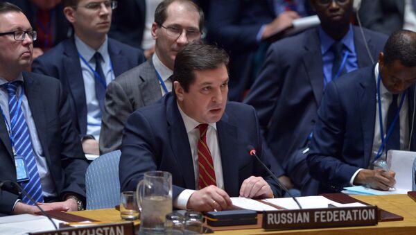 Russia's deputy UN ambassador, Vladimir Safronkov speaks during an United Nations Security Council meeting on Syria - 俄羅斯衛星通訊社