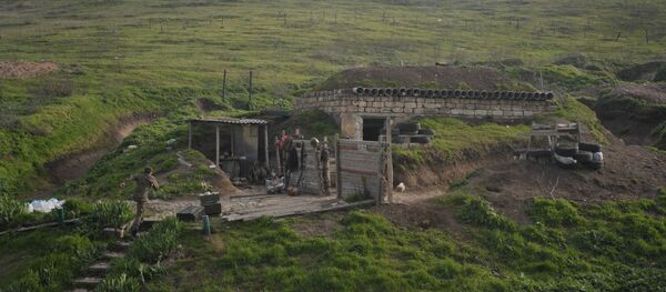 Солдаты карабахской армии на передовых позициях у линии разграничения в Нагорном Карабахе Солдаты карабахской армии на передовых позициях у линии разграничения в Нагорном Карабахе - 俄罗斯卫星通讯社